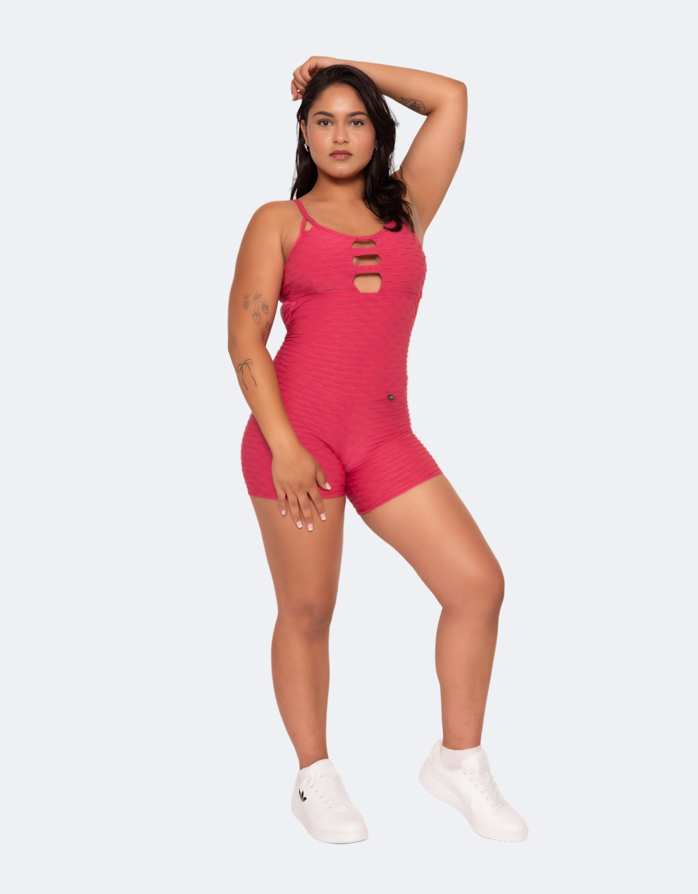 Close-up of Zero Flaws fabric texture and removable padded bra detail on the Amelia Pink Short Brazilian Jumpsuit.