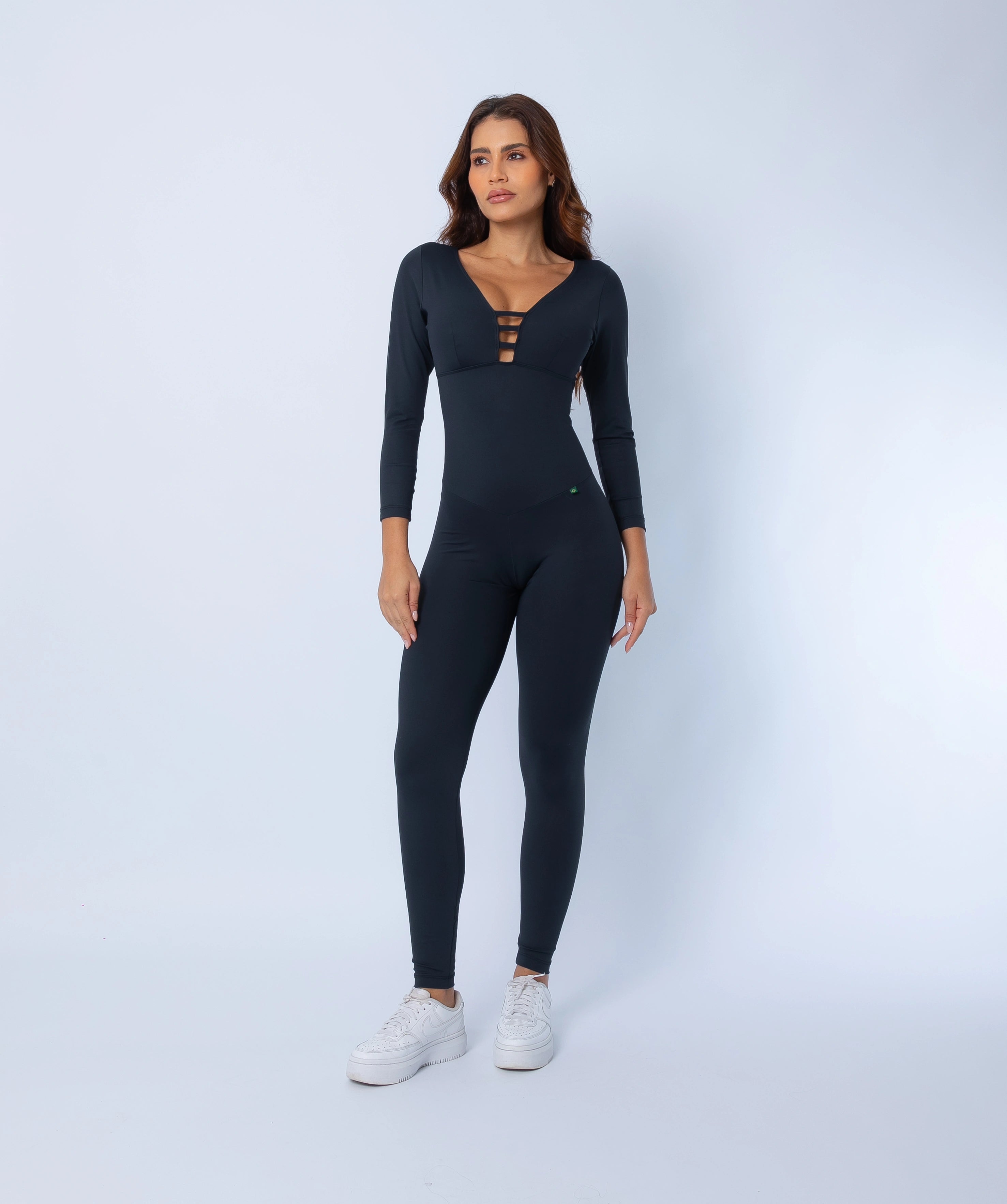 Fashion Brazil Elevate Long Sleeve Jumpsuit view, showing body-sculpting compression fit, long sleeves, and streamlined silhouette.