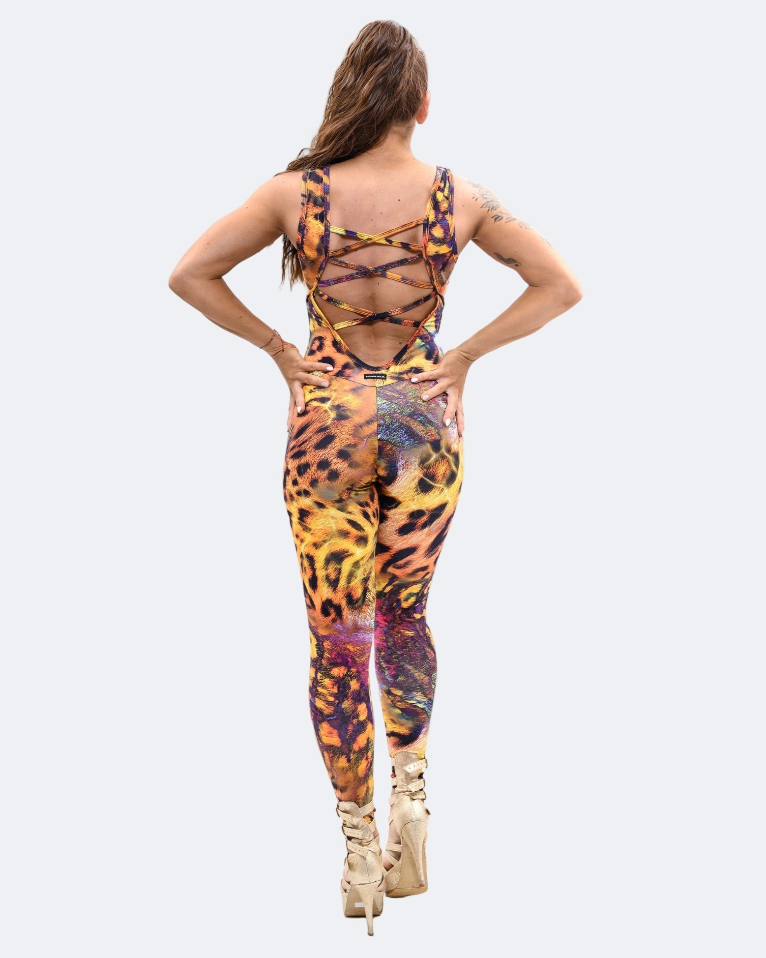 Model wearing Safari Brazilian Workout Jumpsuit with Crossed back Details