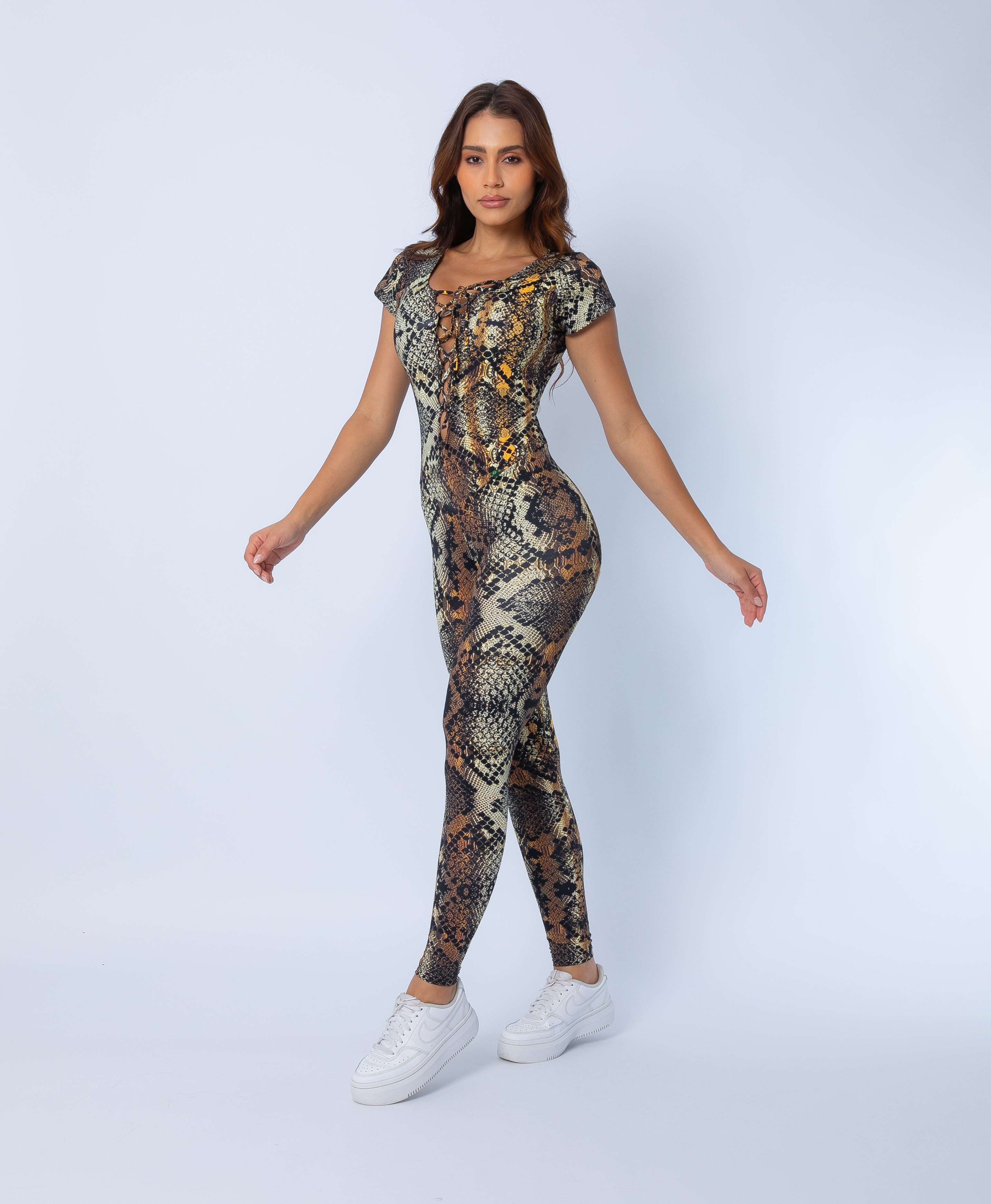 Fashion Brazil Golden Cobra Cap Sleeve Jumpsuit side view, highlighting sculpting fit, cap sleeves, and shimmering golden snake-print pattern on a white background. 