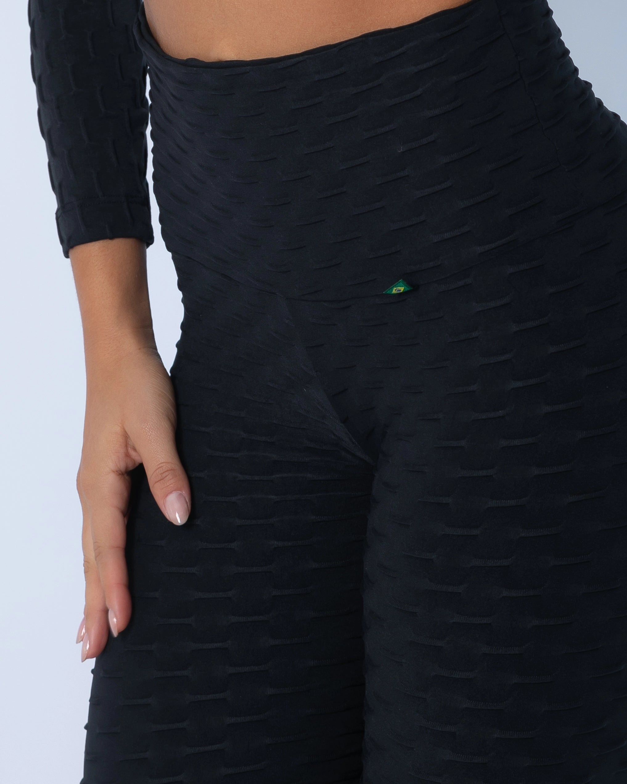 Fashion Brazil Luna Zero Flaws Scrunch Booty Leggings, close-up showing double-layered high-rise waistband for core support in textured fabric.