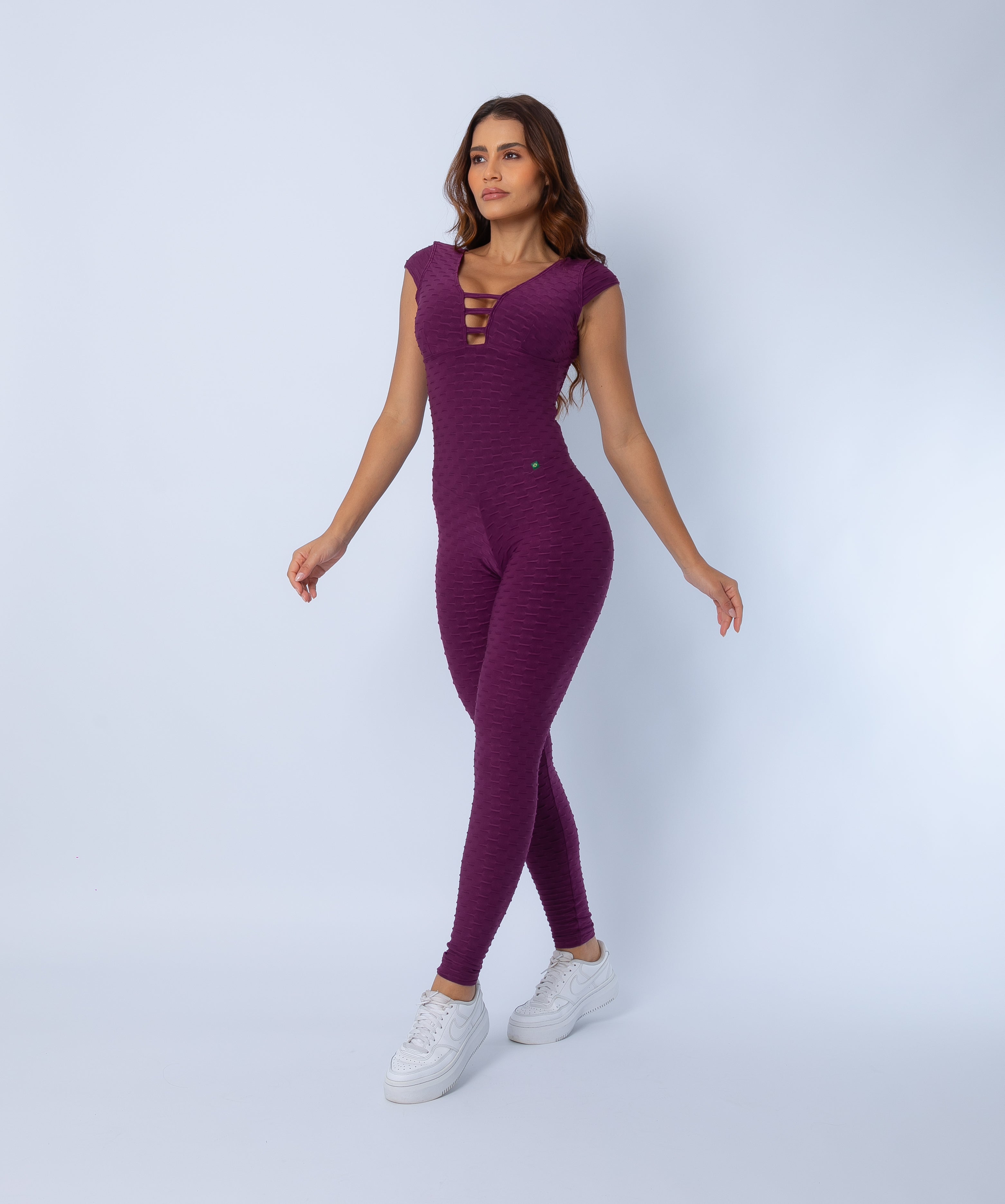 Fashion Brazil Selena Cap Sleeve Jumpsuit, side view highlighting sculpting fit, cap sleeves, and buttery soft Zero Flaws textured fabric.