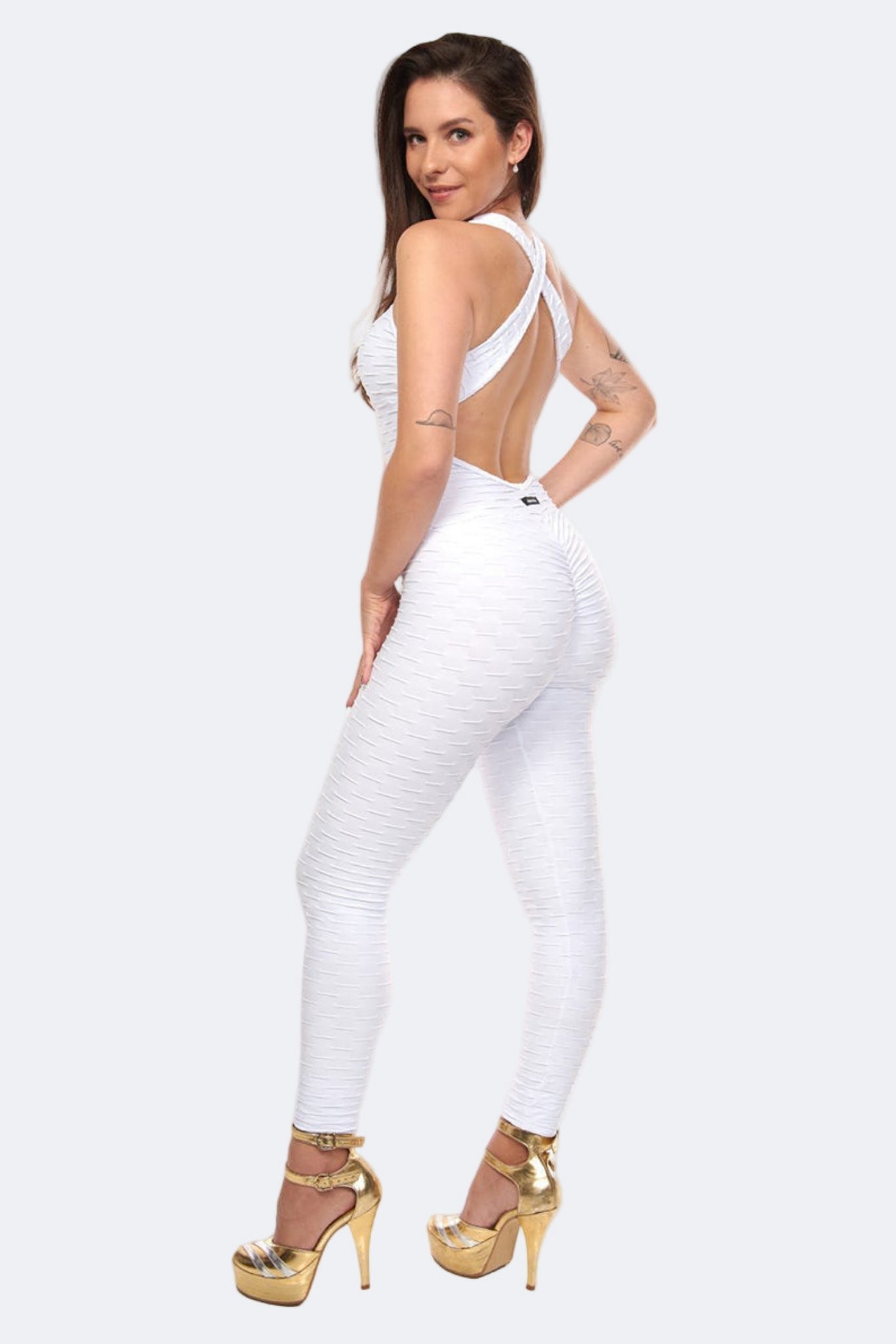 Fashion Brazil Bianca White Jumpsuit, side view showing sculpting silhouette, scrunch booty Brazilian butt lift effect, and premium textured fabric.